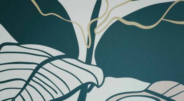 Abstract floral artwork in teal and beige tones displayed on a wall